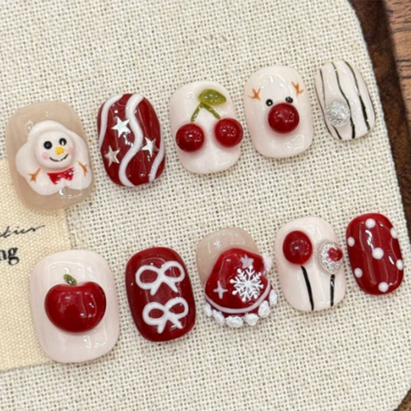 Festive Winter Wonderland Short Square Red and Cream Press On Nail Set Featuring Charming Holiday Designs