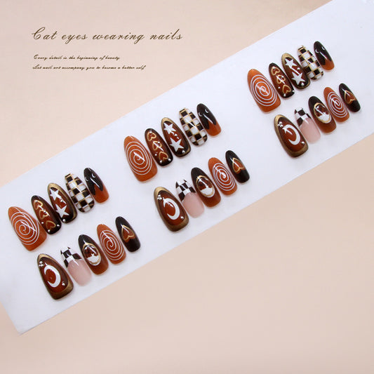 Mystical Cat Eyes Long Almond Brown and Black Swirl Press On Nail Set with Glittering Star Accents