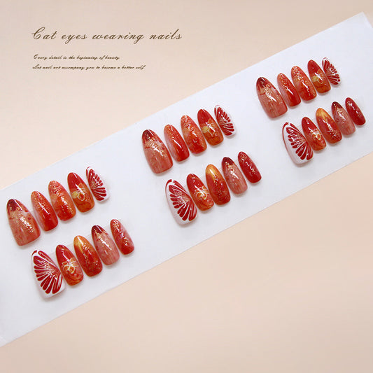 Mystical Sunset Cat Eye Press-On Nail Set Long Almond Shape Vibrant Red with Glittering Floral Design