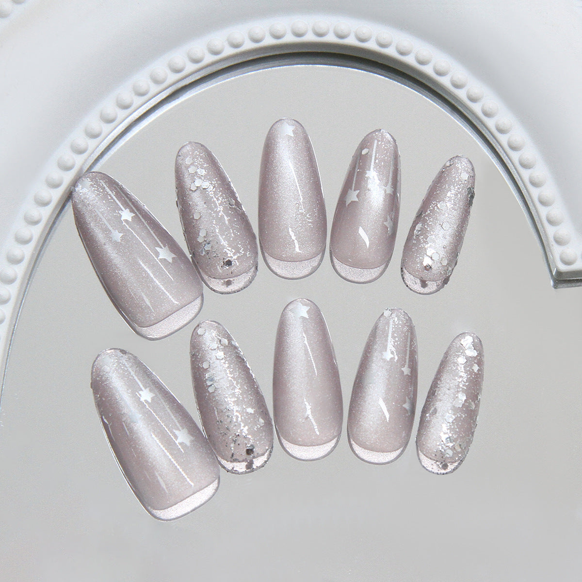Celestial Sparkle Long Almond Beige Nails with Glittering Star Accents
