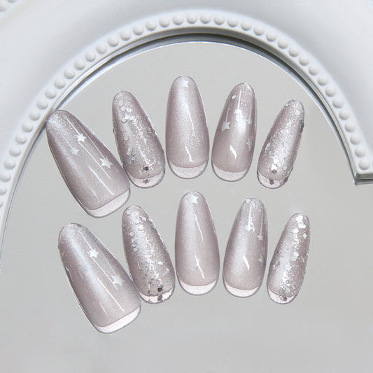Celestial Sparkle Long Almond Beige Nails with Glittering Star Accents