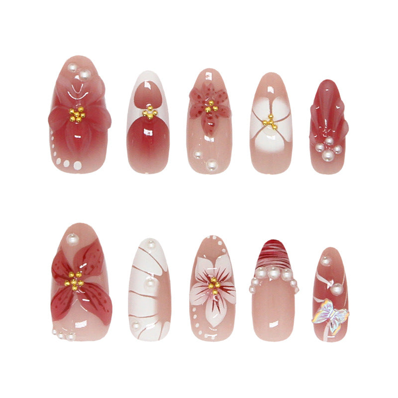 Charming Floral Design Long Almond Shaped Soft Pink Nails with Artistic Pearl Accents