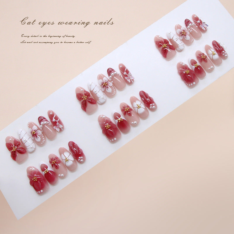 Whimsical Floral Cat Eye Press-On Nail Set Long Oval Soft Pink with Charming Pearl Accents