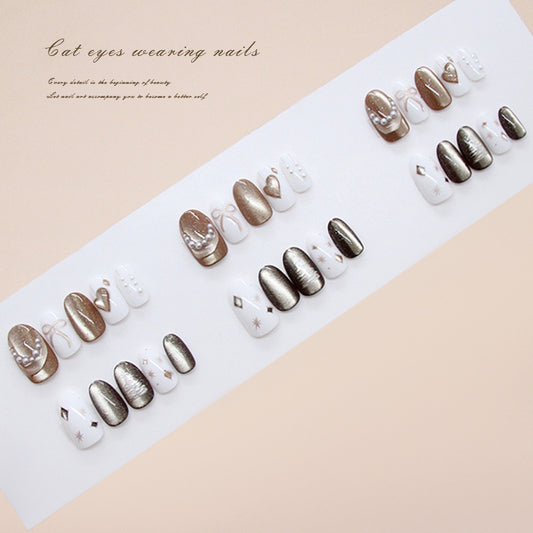 Mystical Elegance Press On Nail Set Short Oval White and Brown with Cat Eye Effect and Decorative Accents
