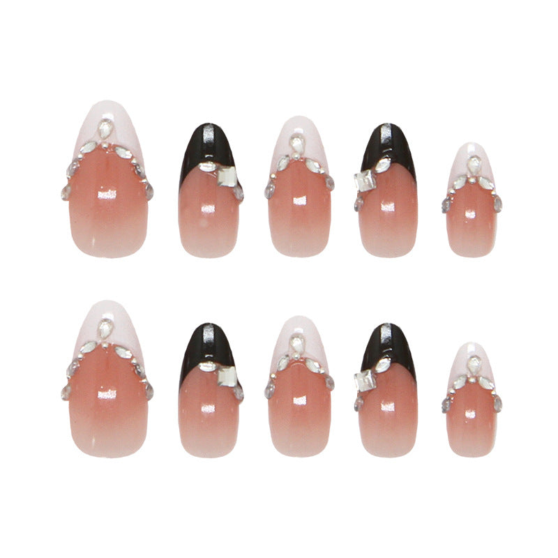 Glamorous Stardust Long Almond Ombre Rose Pink and Black Nails with Shimmering Gemstone Accents