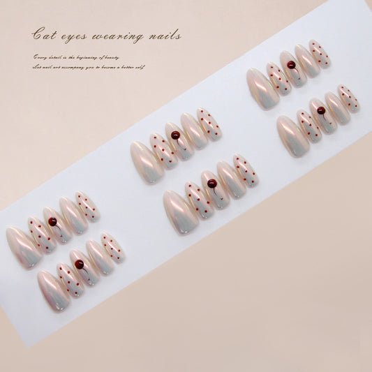 Cat Inspired Elegant Long Almond Shaped Soft Pink Press On Nail Set with Striking Red Dots and Glossy Finish