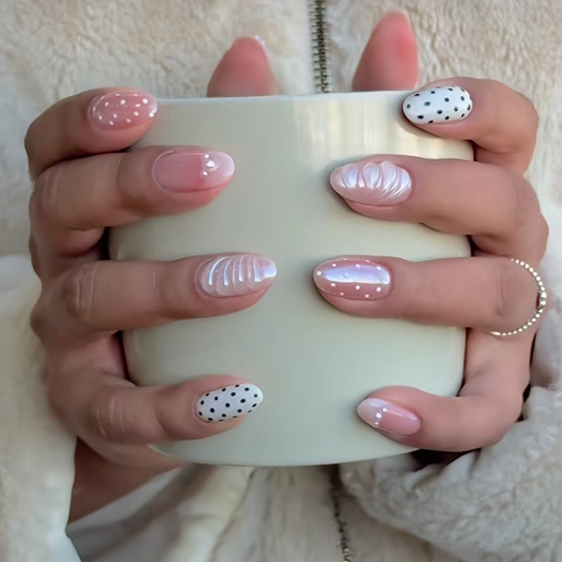 Chic and Polished Medium Almond Pink Ombre Nail Set with Unique Textured Designs