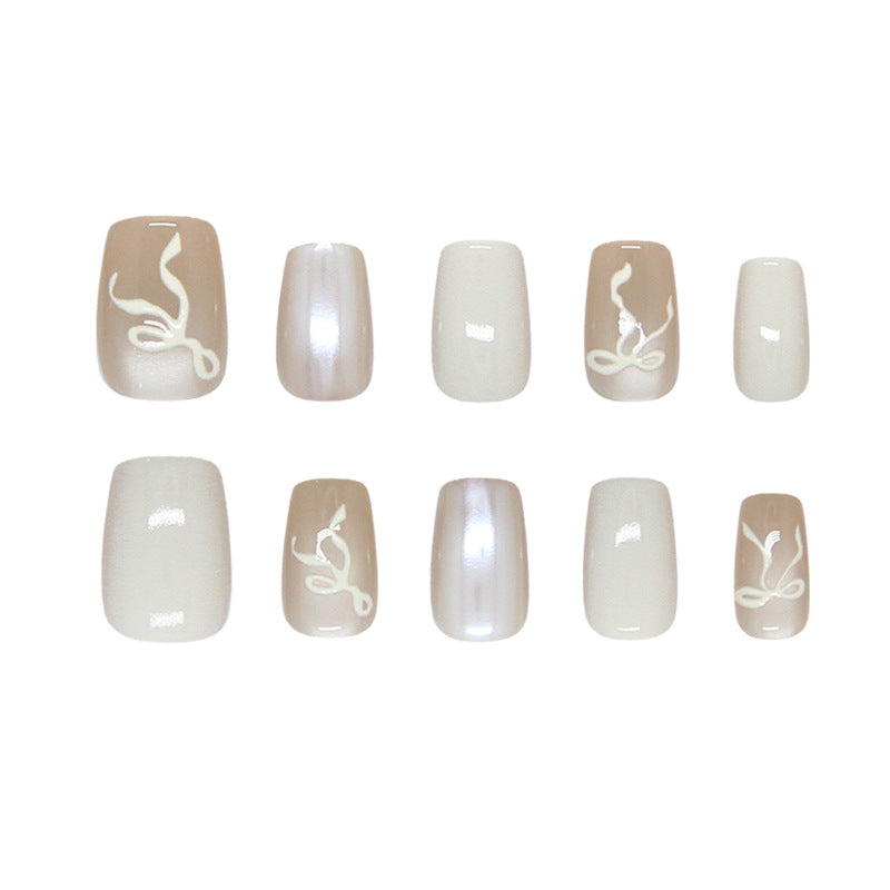 Elegant Serenity Short Square Beige Nails with Unique Floral Design