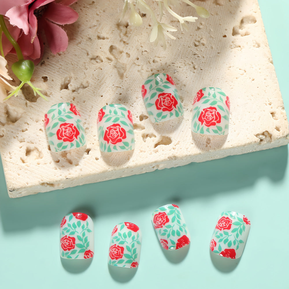 Floral Fantasy Medium Length Oval Mint Green Press-On Nail Set with Red Rose Accents