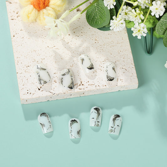 Elegant Marble Magic Long Coffin White and Black Press On Nail Set with Minimalist Design