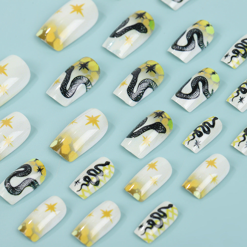 Celestial Chic Medium Square White and Yellow Press on Nails with Star and Snake Design