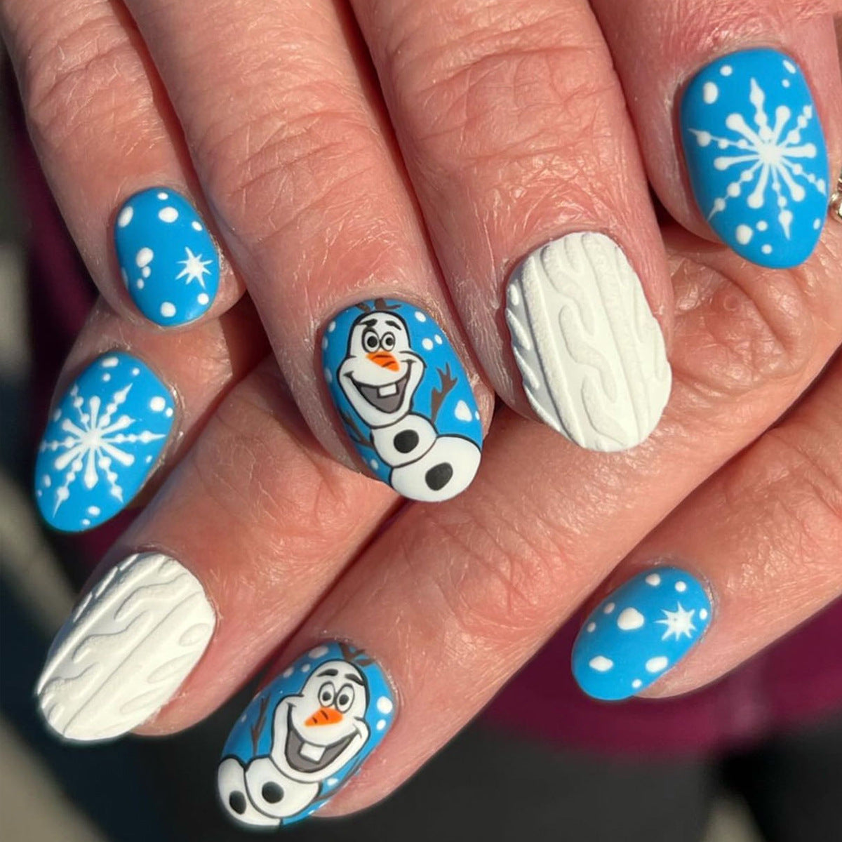 Frozen Wonderland Medium Oval Light Blue And White Press On Nail Set With Olaf And Snowflake Designs