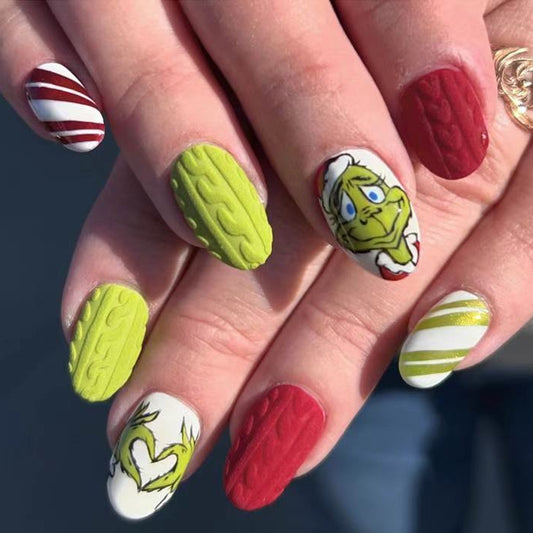 Grinch Inspired Medium Almond Green Red And White Press On Nail Set With Unique Textured Designs And Fun Character Art