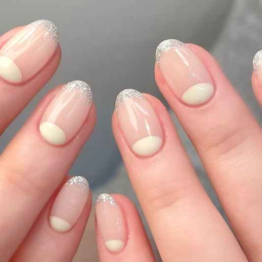 Glimmering Elegance Short Oval Soft Pink Nails with Shimmering Silver Tips