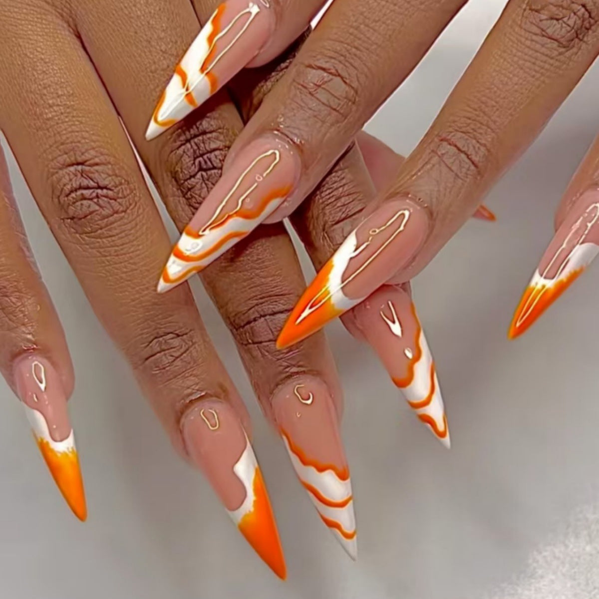 Sunny Citrus Dream Long Stiletto Press-On Nails in Vibrant Orange with Unique Marble Accent
