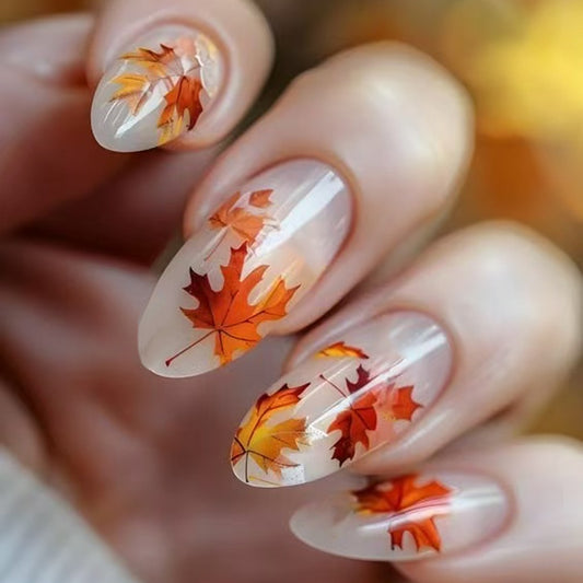Autumn Leaves Elegant Medium Oval Press On Nail Set in Translucent Orange and Yellow with Leaf Design