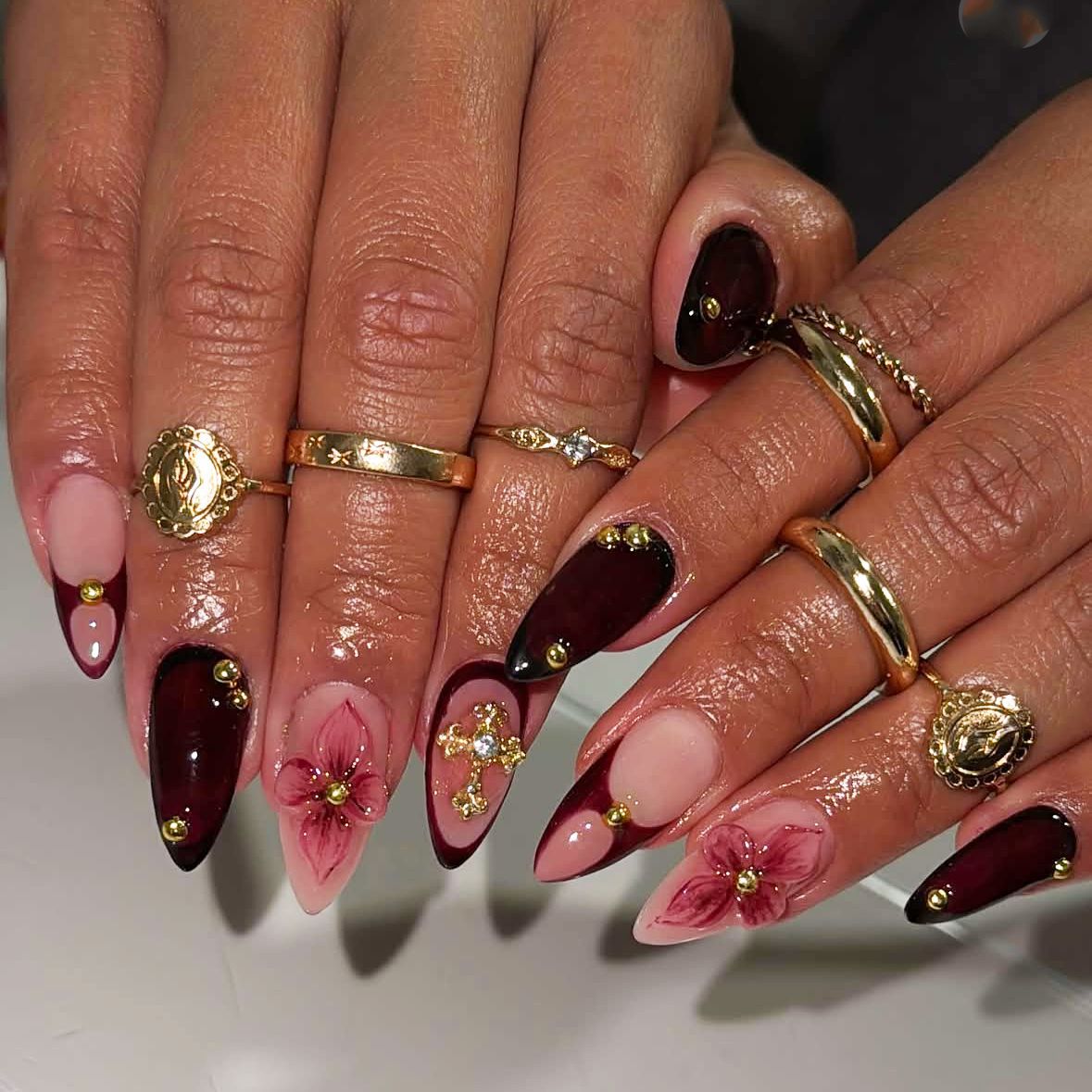 Gothic Elegance Long Almond Burgundy and Beige Nail Set with Floral Accents and Gold Studs