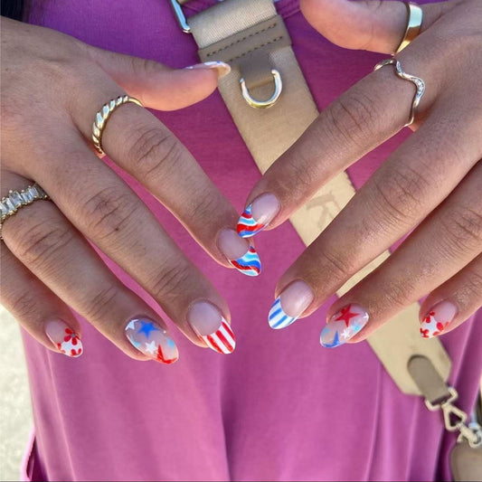 Patriotic Celebration Medium Almond Press-On Nail Set in Vibrant Red White and Blue with Festive Star and Stripe Designs