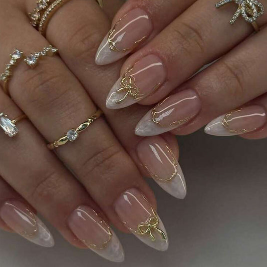 Glamorous Elegance Long Almond Clear and White Press On Nails with Dazzling Gold Accent Bows