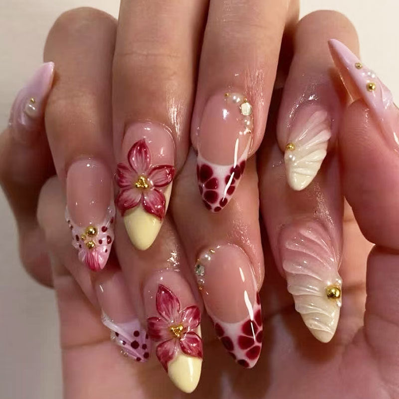 Blossoming Elegance Long Almond Pink and White Floral Nail Set with Unique Accents