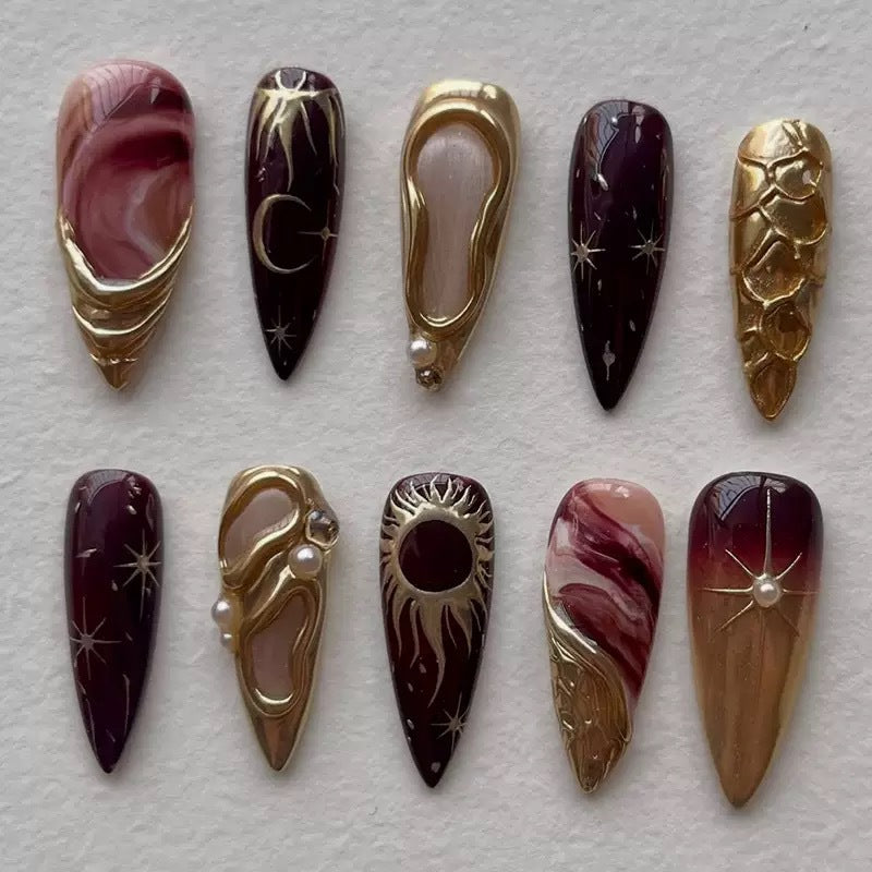 Celestial Elegance Long Almond Maroon With Gold Accents and Unique Starburst Design Press On Nail Set