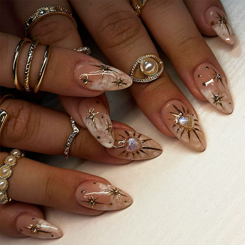 Celestial Chic Medium Almond Beige Nails with Starry Accents
