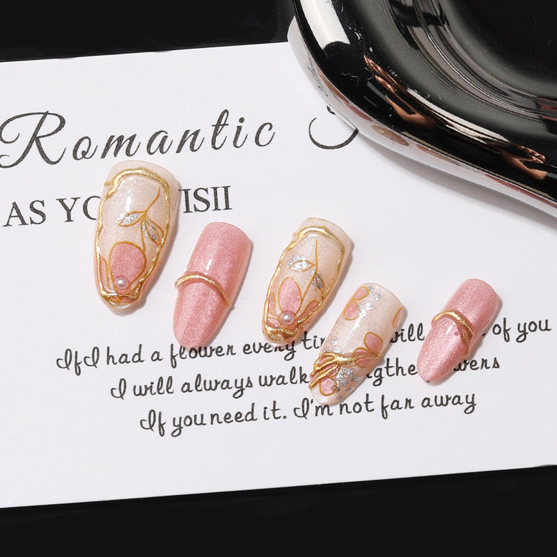 Enchanting Floral Short Oval Pink Nails with Elegant Gold Accents