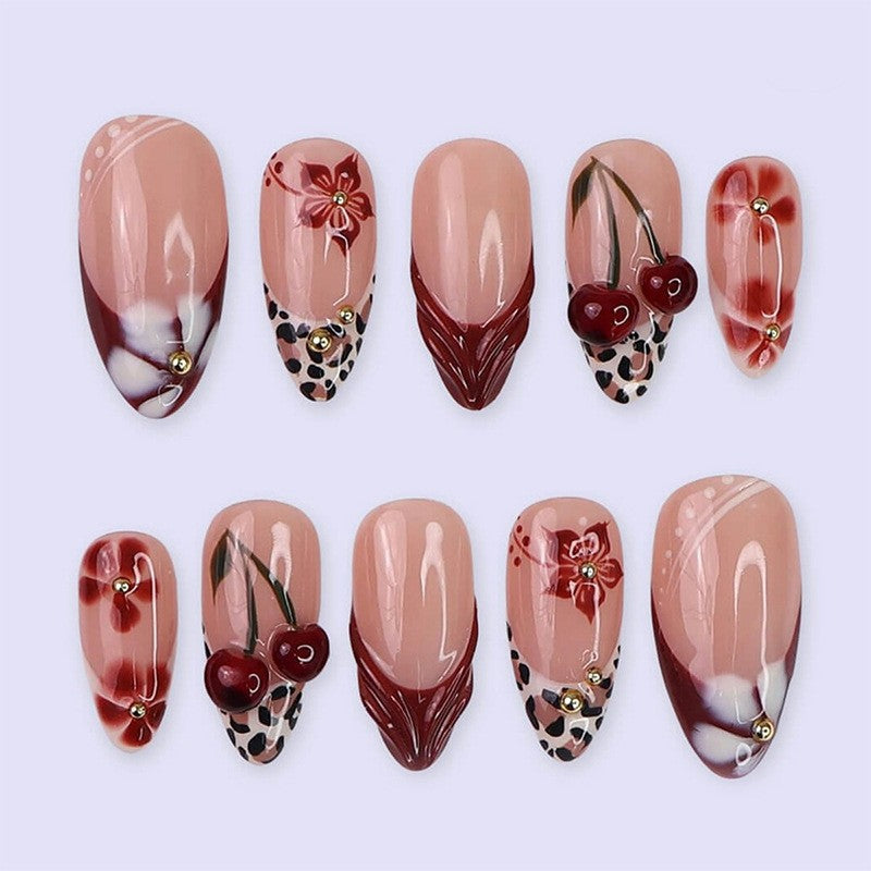 Charming Floral Elegance Medium Almond Pink Press On Nail Set with Artistic Designs and Unique Accents