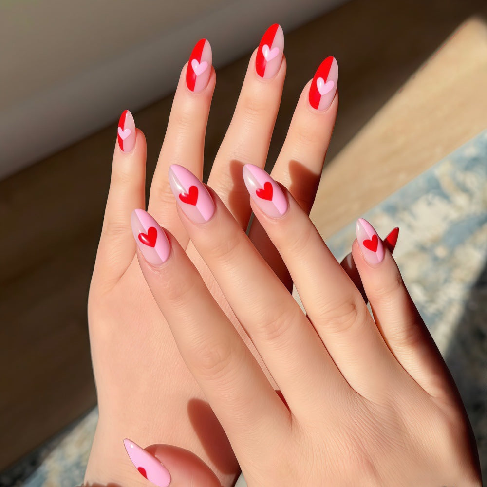 Romantic Charm Long Almond Pink and Red Nails with Heart Accents