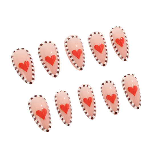 Sweetheart Glamour Long Almond Pink Nails with Heart Patterns and Dotted Edges