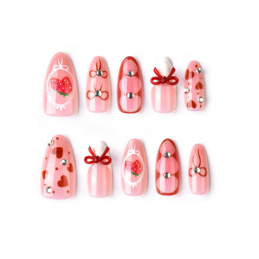 Sweetheart Strawberry Themed Medium Almond Pink Nail Set with Charming Bow and Gem Details