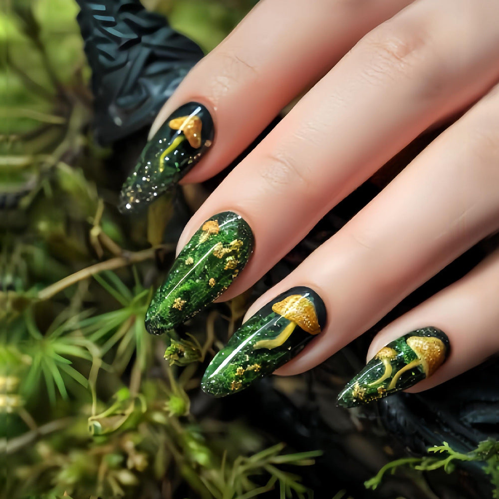 Whimsical Forest Fantasy Long Oval Green Nail Set Featuring Glittering Gold and Mushroom Designs