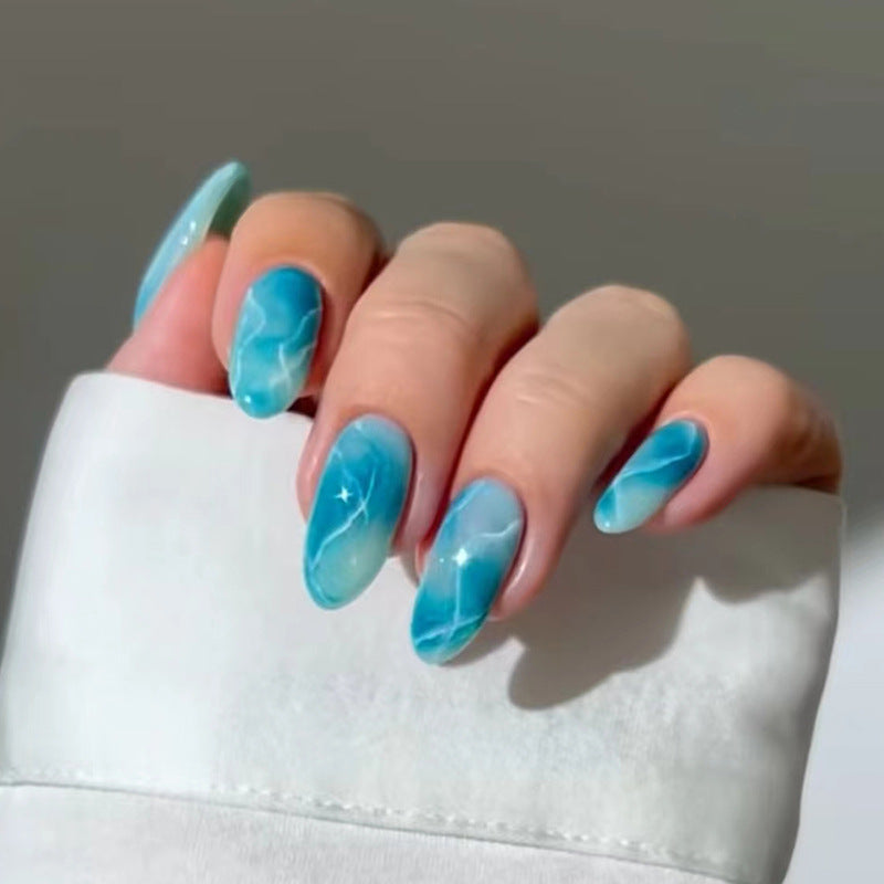 Mermaid Magic Long Almond Sky Blue Press On Nail Set with Shimmering Marble Accent