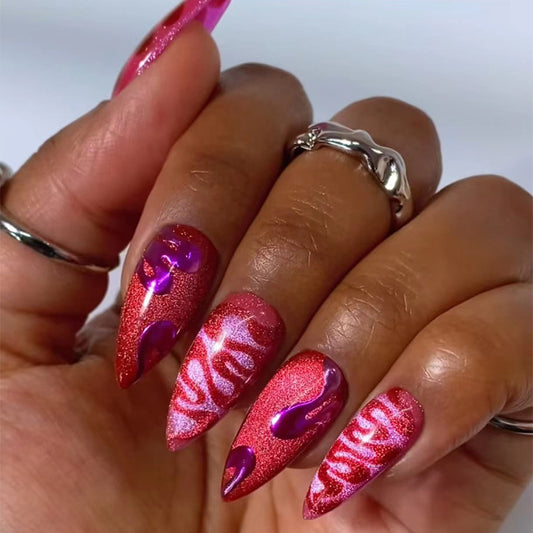Cosmic Charm Long Almond Pink Glitter Press On Nails with Purple Accents and Zebra Print Design