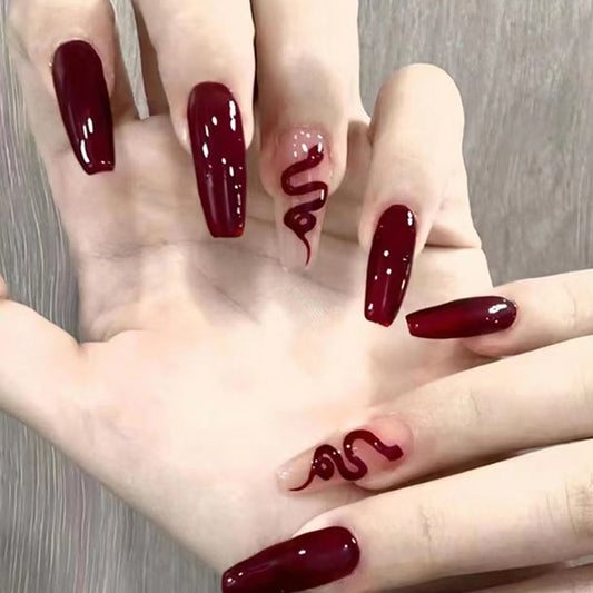 Glamorous Serpent Inspired Long Coffin Burgundy Press On Nail Set with Unique Snake Design Accent
