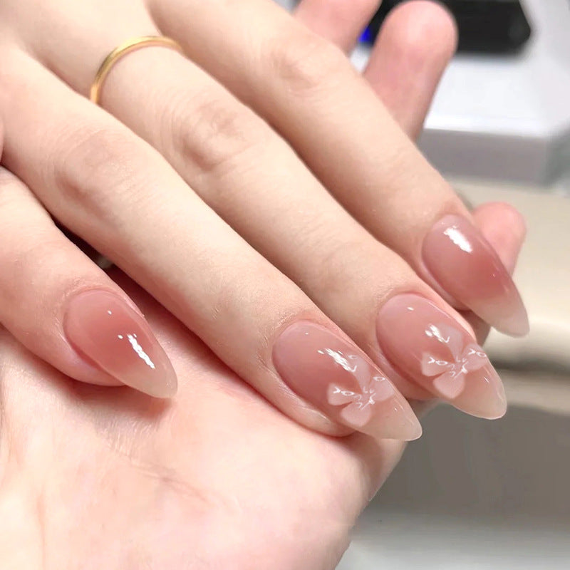 Glamorous Whimsy Medium Almond Beige Nails with Unique Glossy Finish