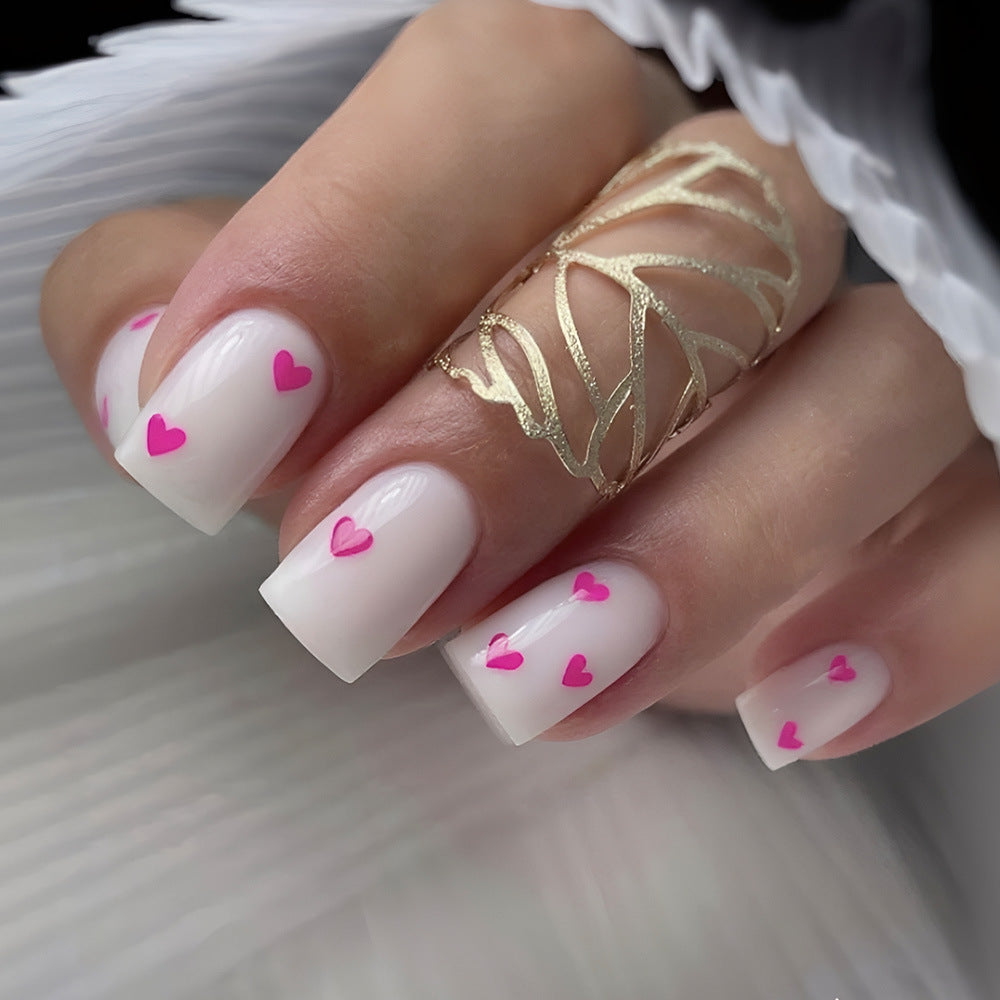 Love in Bloom Elegant Short Square Press On Nail Set with Glossy White Finish and Charming Pink Heart Accents