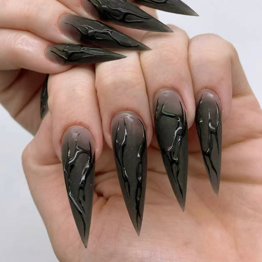Gothic Elegance Long Stiletto Black Nails with Unique Cracked Effect
