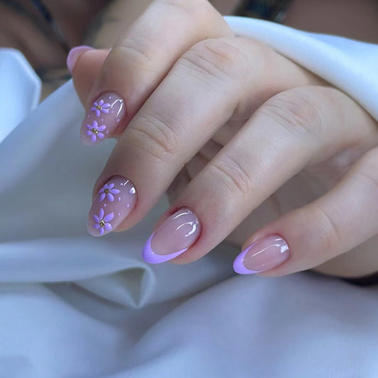 Whimsical Floral Elegance Medium Almond Lavender and Clear Press-On Nail Set with Charming Flower Accents