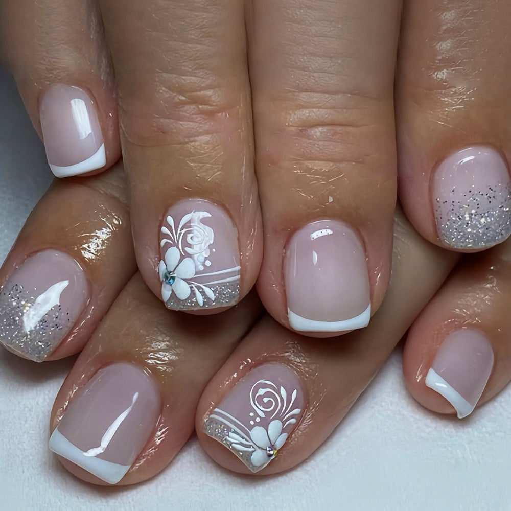 Blossom Elegance Short Square Pink Nails with Glittery French Tips and Floral Design