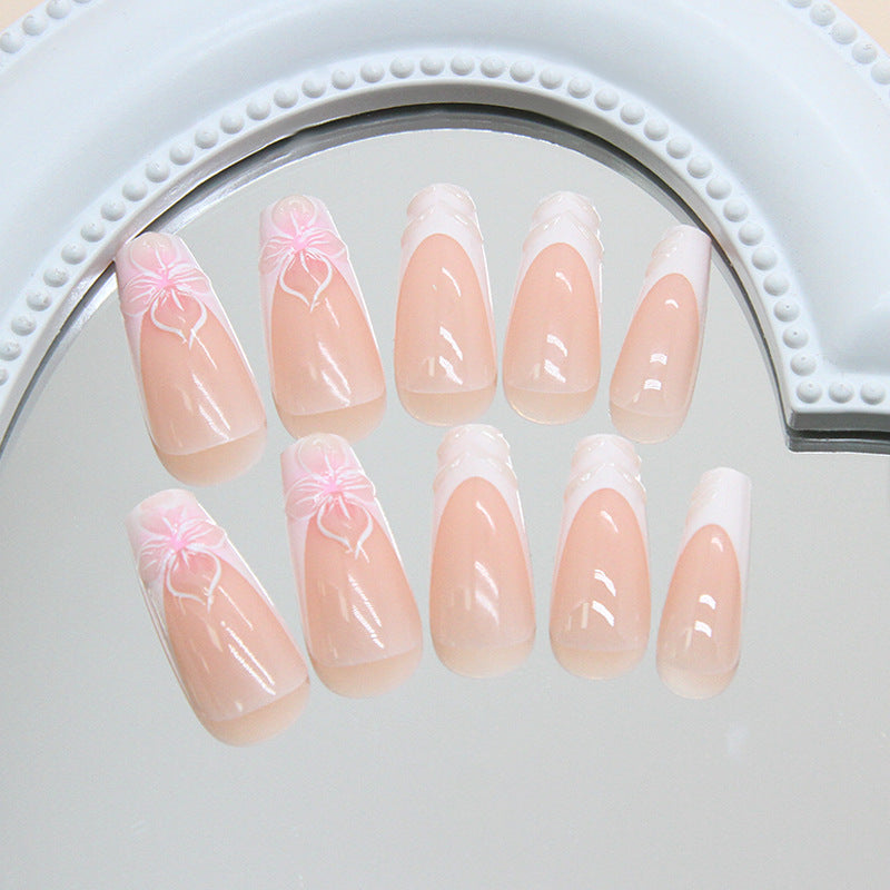 Blossom Elegance Long Coffin Soft Pink Nails with Delicate Floral Designs