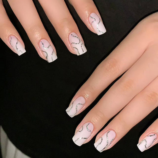Elegant Chic Short Square White Nails with Glittery Swirl Design for Stunning Floral Inspired Look