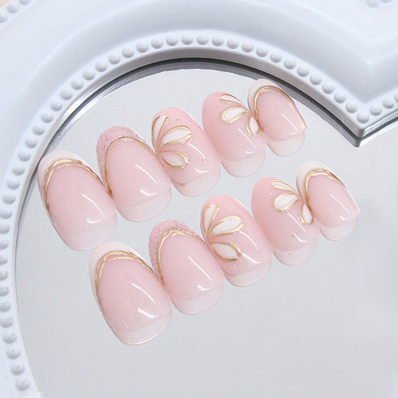 Chic Floral Fantasy Short Oval Pink Press On Nail Set with Elegant Gold Accents