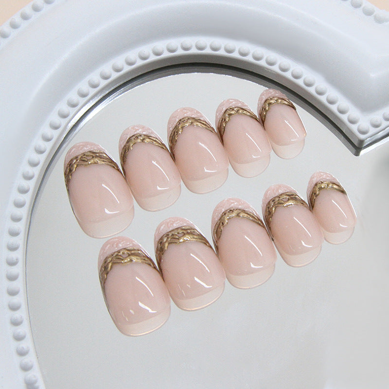 Glamorous Elegance Short Oval Light Pink Press On Nail Set with Intricate Gold Detailing
