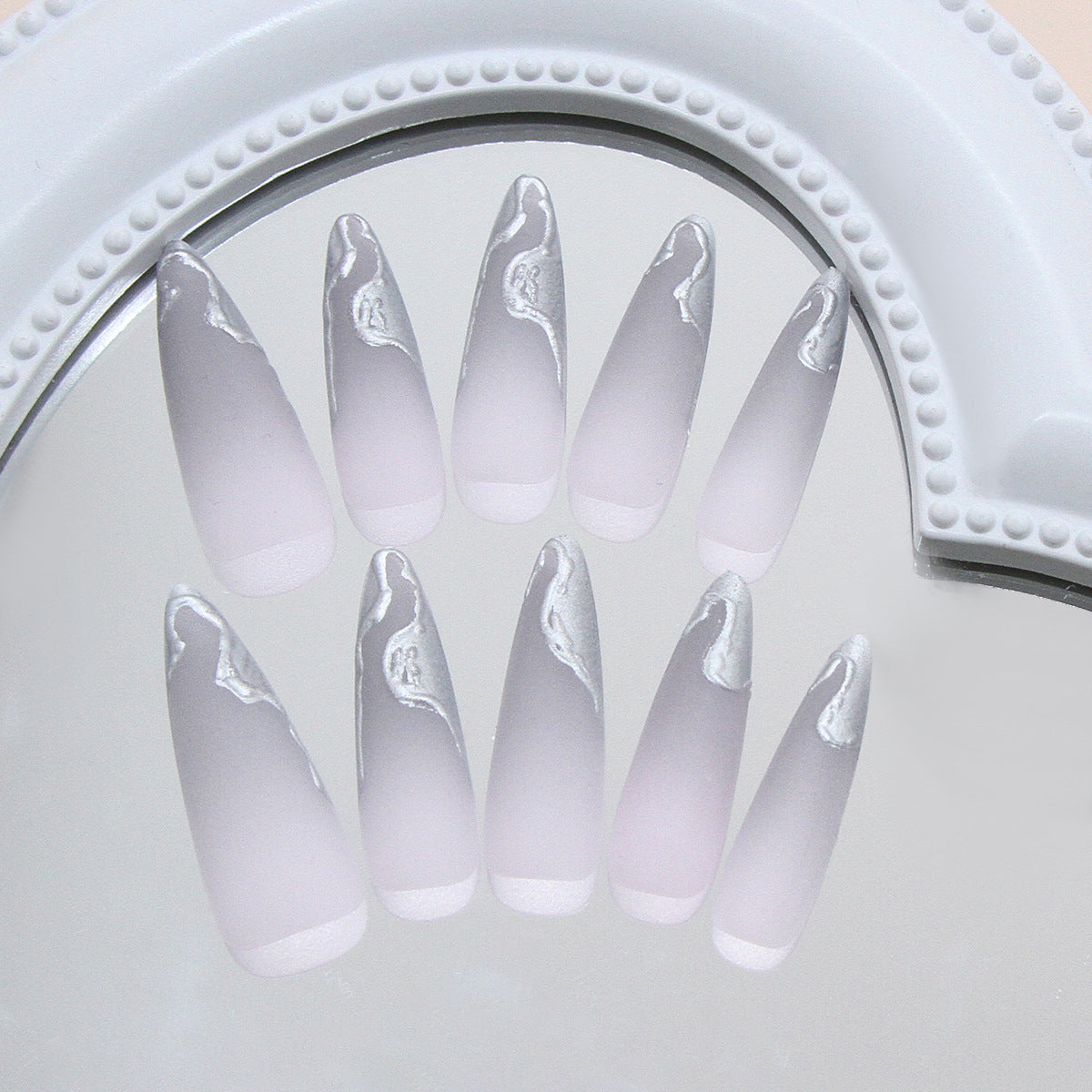 Dreamy Elegance Long Almond Ombre Nails with Artistic Silver Accents