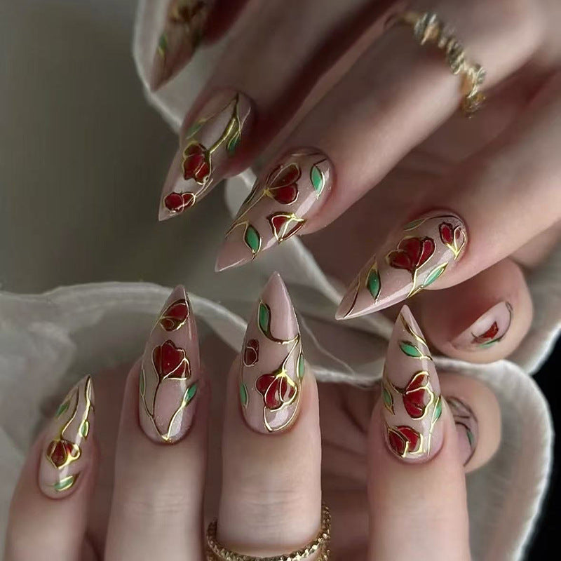 Elegant Floral Fantasy Medium Stiletto Beige Red and Green Nail Set with Intricate Gold Detailing