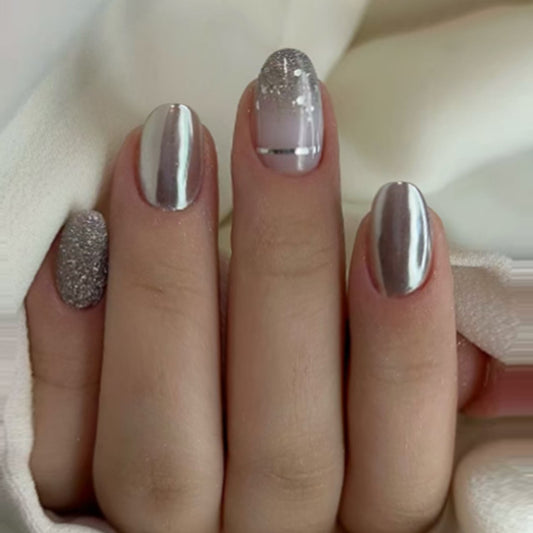 Glamorous Metallic Medium Oval Shaped Silver Press-On Nail Set with Sparkling Glitter Accent