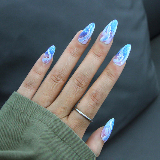 Celestial Dreamscape Medium Almond Press on Nail Set in Blue and White with Iridescent Cosmic Design