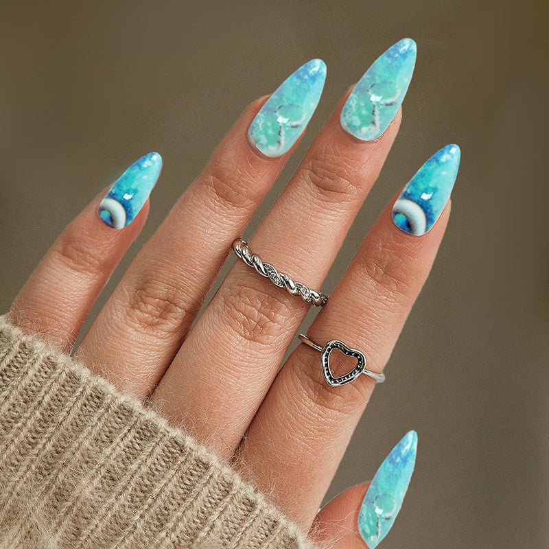 Ocean Breeze Medium Almond Faux Nail Set in Aquatic Hues with Unique Marble Design