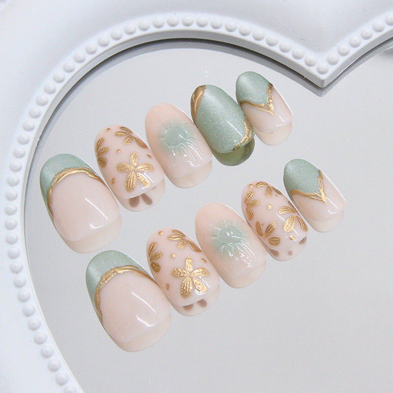 Enchanted Garden Short Oval Green and Peach Floral Press On Nail Set with Golden Accents